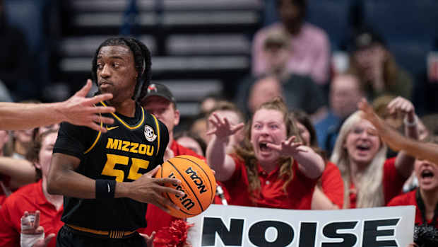 Missouri Tigers guard Sean East II (55) tries to inbound the ball against the Georgia Bulldogs during their first round SEC Men's Basketball Tournament at Bridgestone Arena in Nashville, Tenn., Wednesday, March 13, 2024.